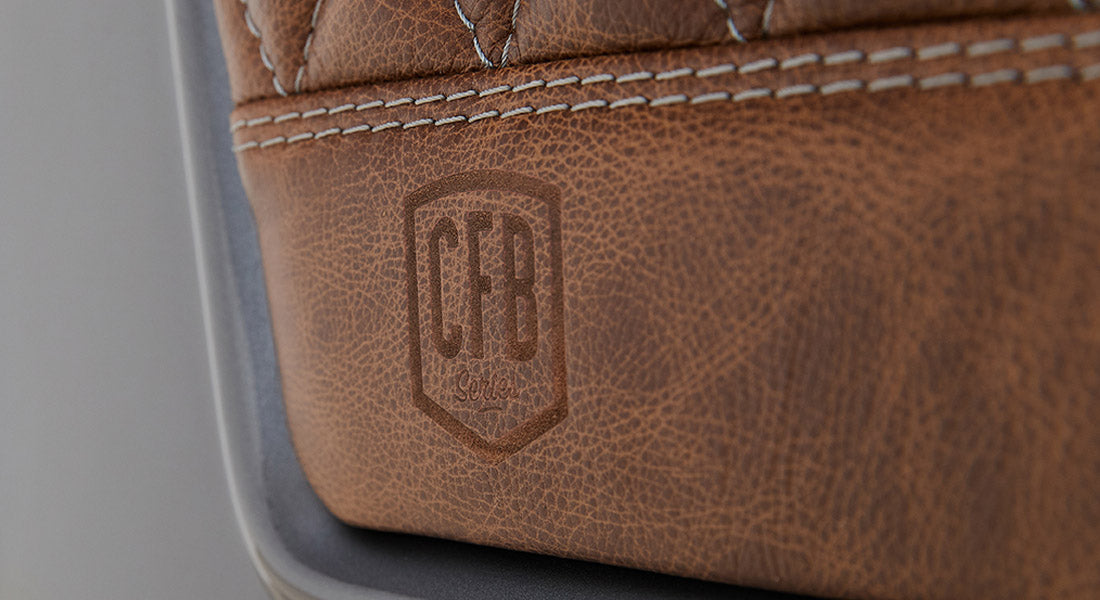 Brown leather seat with embossed CFB Series logo in Classic Ford Bronco