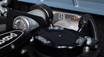 Engine compartment with Classic Ford Bronco branded components and polished parts