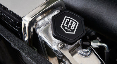 Metal component with black hexagonal cap labeled 'CFB Series' in Classic Ford Bronco engine area