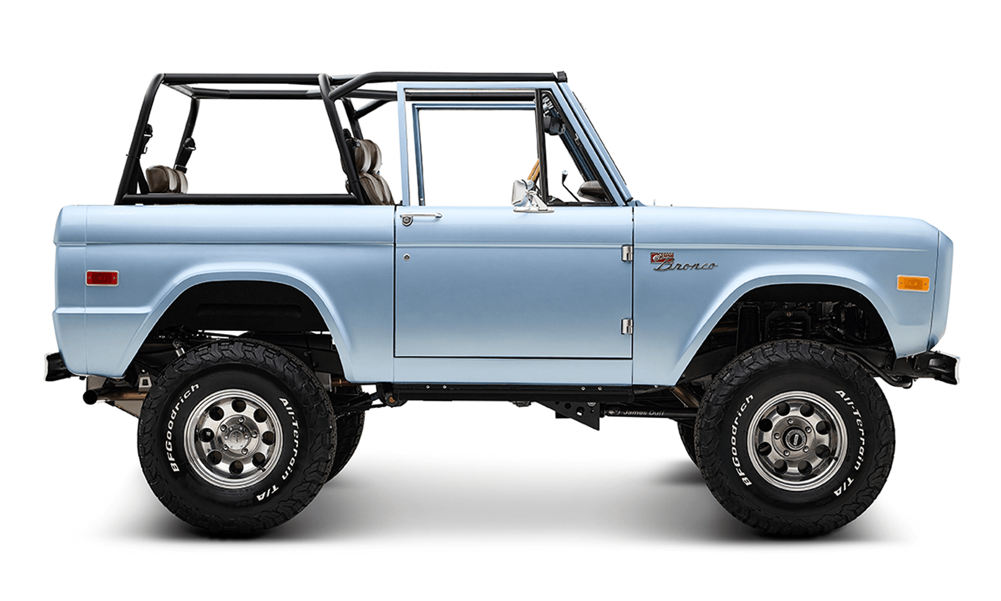 1974 Blue Classic Ford Broncos Coyote Series with custom leather interior, custom carpet and family roll cage