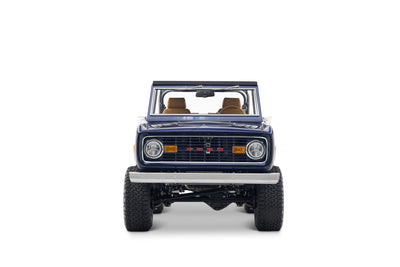 Blue Classic Ford Bronco with open top shown front view on white background
