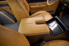Tan leather center console and seat in Classic Ford Bronco interior