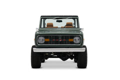 Green Classic Ford Bronco with open top shown front view on white background