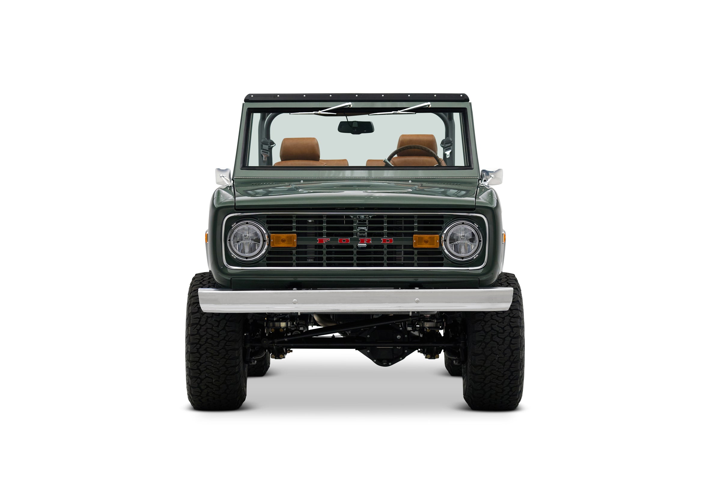 Green Classic Ford Bronco with open top shown front view on white background