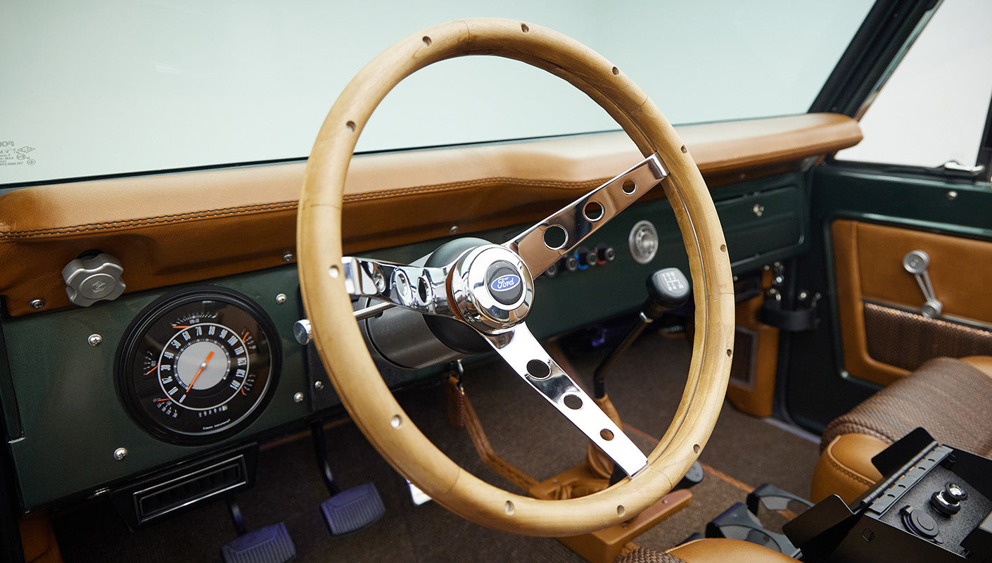1973 classic ford bronco in highland green steering wheel detail