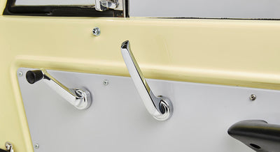 Classic Ford Bronco interior door with chrome door handle and window crank on beige panel