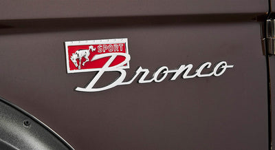 Classic Ford Bronco side emblem reading 'Sport Bronco' with horse logo