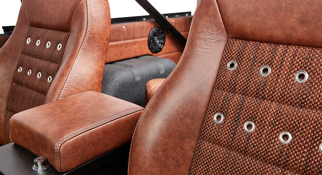 Close-up of brown textured and perforated leather classic car seats