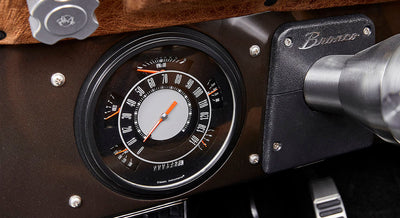 Close-up of Classic Ford Bronco speedometer and tachometer with odometer reading