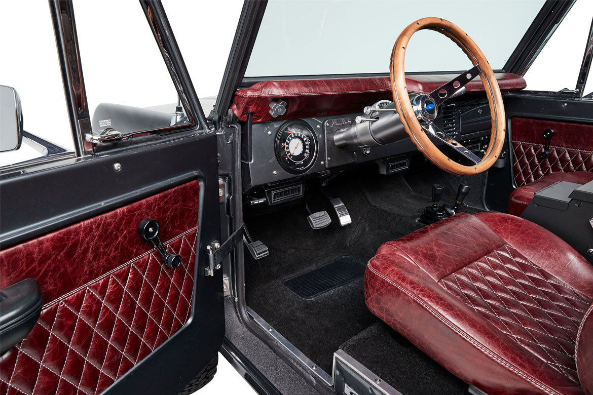 Interior door panel with quilted red leather on Classic Ford Bronco