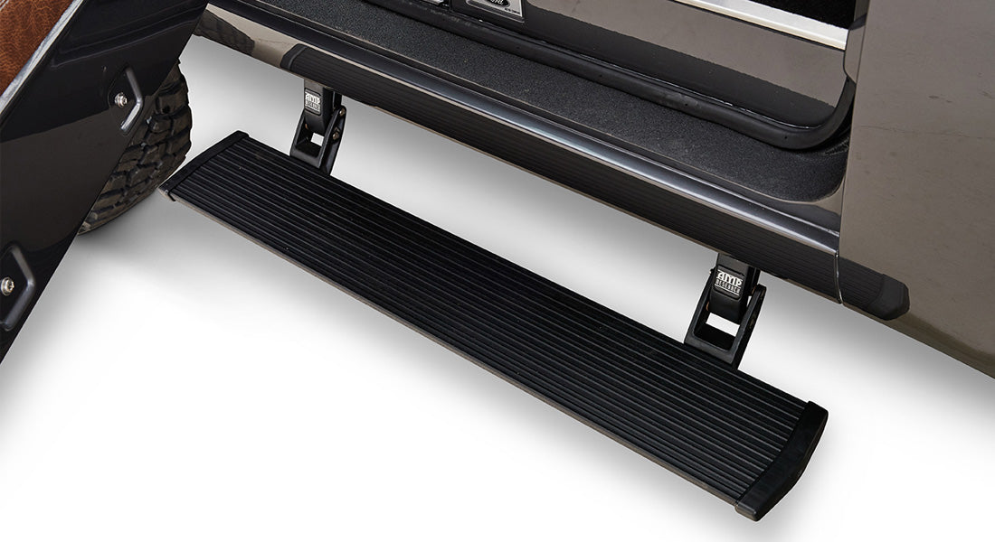 Black retractable running board door step extended from Classic Ford Bronco
