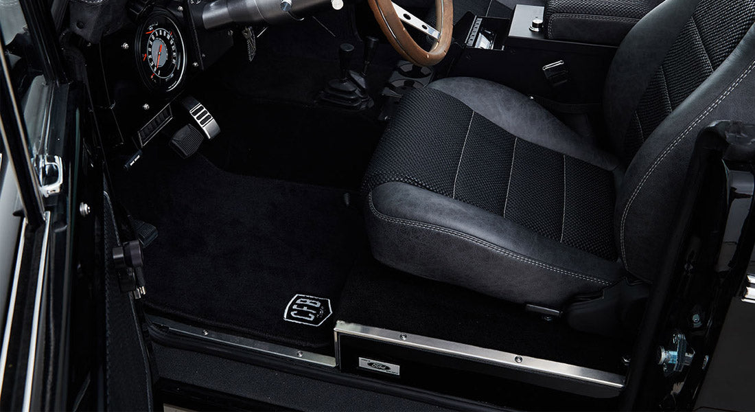 Classic Ford Bronco driver's seat and floor mat with CFB Series logo in black and gray tone