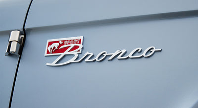 Classic Ford Bronco door side with Sport Bronco badge in red and white
