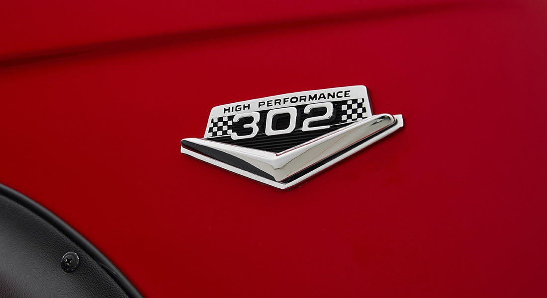 High Performance 302 chrome badge on red Classic Ford Bronco fender