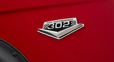 High Performance 302 chrome badge on red Classic Ford Bronco fender