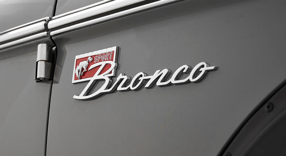 Bronco Sport emblem on gray Classic Ford Bronco door near hinge and handle