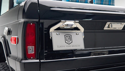 Rear view of Classic Ford Bronco tailgate with CFB Series plate and tail lights