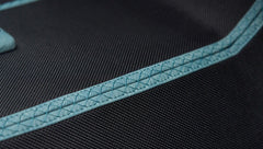 Detailed close-up of upholstery stitching and material in Classic Ford Bronco
