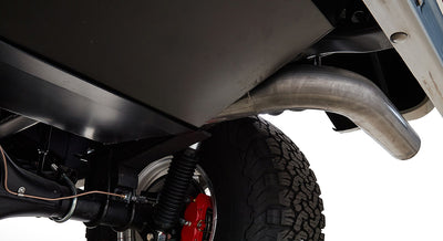 Underside view of Classic Ford Bronco showing exhaust pipe and rear suspension
