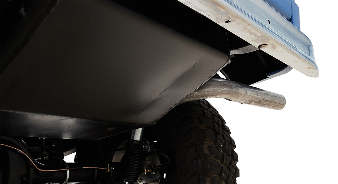 Exhaust pipe and rear tire of a Classic Ford Bronco
