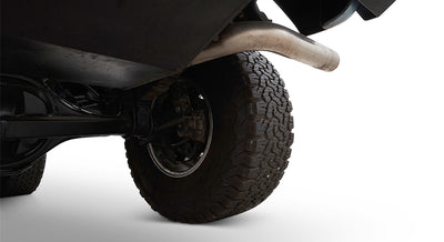 Rear underside view showing tire and exhaust pipe of Classic Ford Bronco