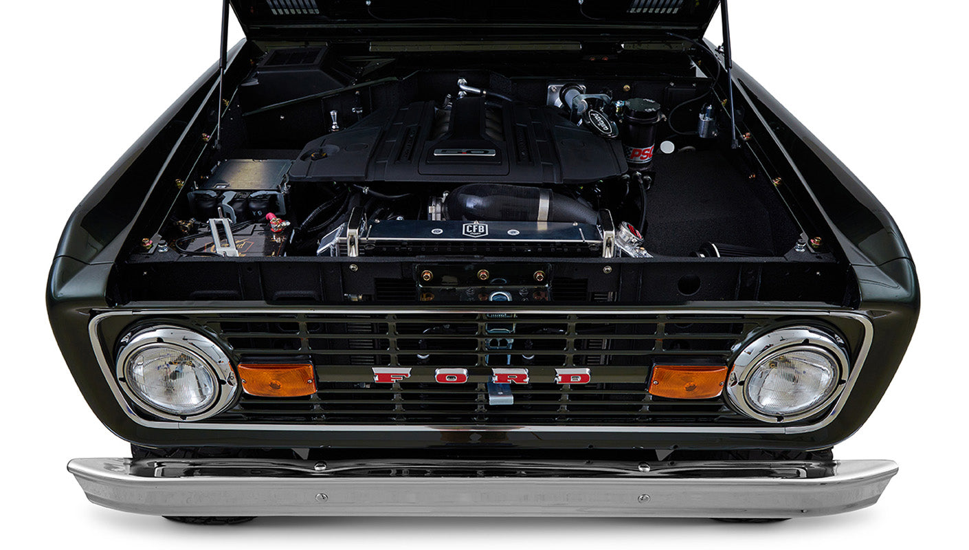 Classic Ford Bronco 1969 Misty Green Coyote Series front view showing grill and headlights