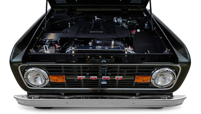 Classic Ford Bronco 1969 Misty Green Coyote Series front view showing grill and headlights