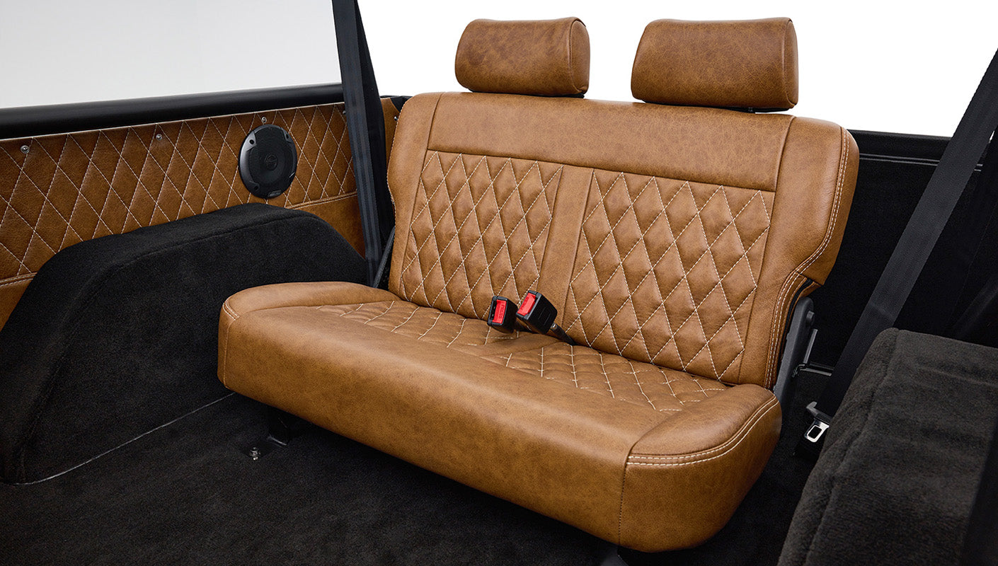 Ford Bronco 1970 in Matte Macadamia Brown with whiskey leather interior and black wheels Wooden Steering Wheel diamond stitch