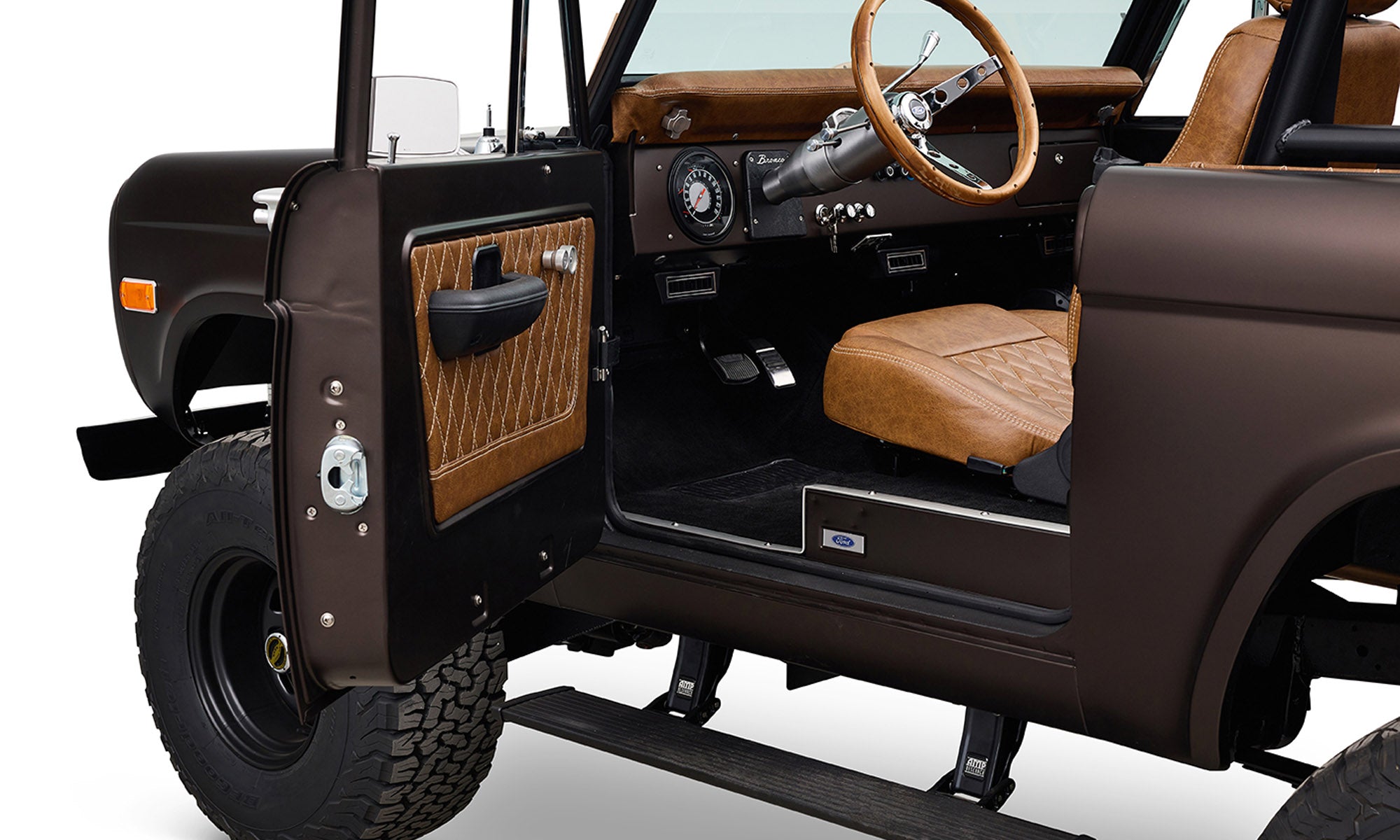 Ford Bronco 1970 in Matte Macadamia Brown with whiskey leather interior and black wheels