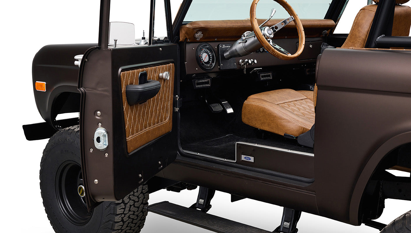 Ford Bronco 1970 in Matte Macadamia Brown with whiskey leather interior and black wheels