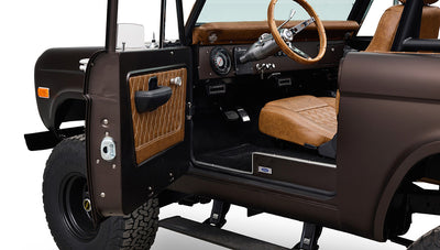 Ford Bronco 1970 in Matte Macadamia Brown with whiskey leather interior and black wheels