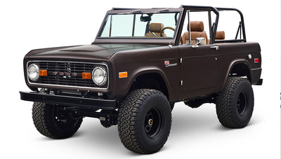 Ford Bronco 1970 in Matte Macadamia Brown with whiskey leather interior and black wheels