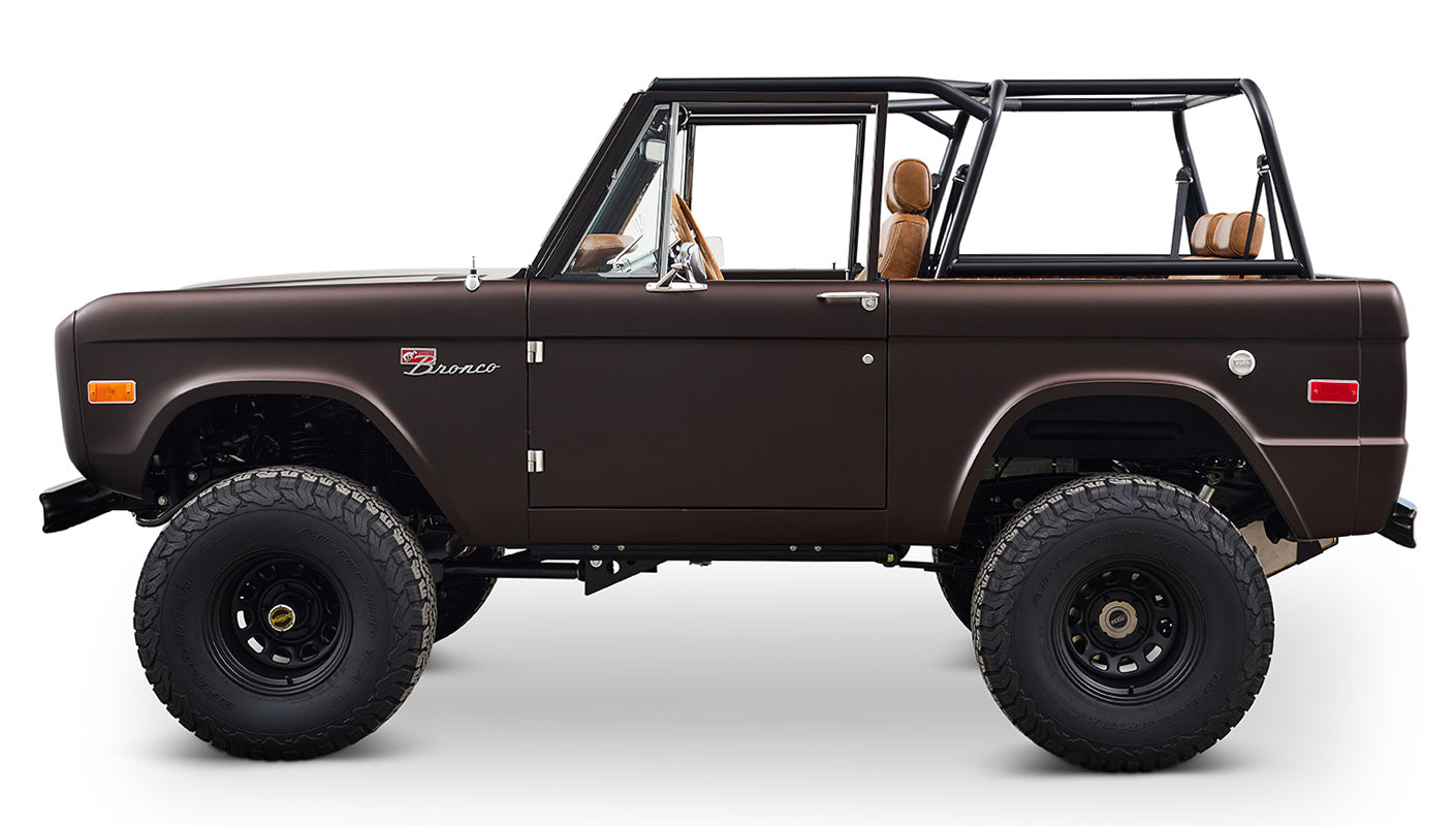 Ford Bronco 1970 in Matte Macadamia Brown with whiskey leather interior and black wheels