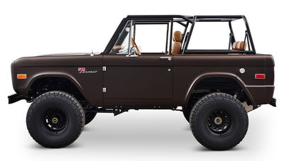 Ford Bronco 1970 in Matte Macadamia Brown with whiskey leather interior and black wheels