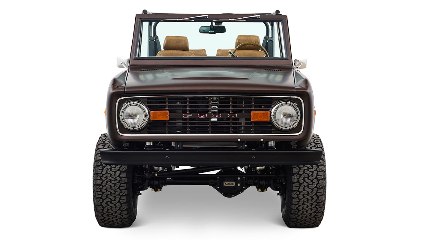 Ford Bronco 1970 in Matte Macadamia Brown with whiskey leather interior and black wheels