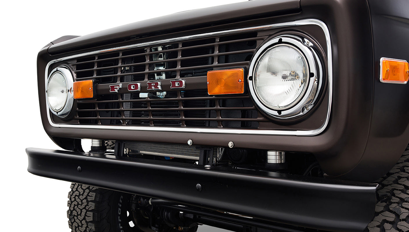 Ford Bronco 1970 in Matte Macadamia Brown with whiskey leather interior and black wheels