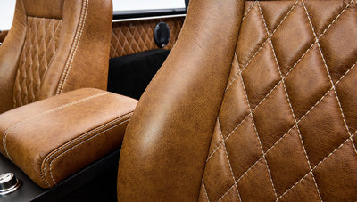 Ford Bronco 1970 in Matte Macadamia Brown with whiskey leather interior and black wheels Wooden Steering Wheel diamond stitch