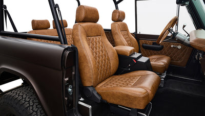 Ford Bronco 1970 in Matte Macadamia Brown with whiskey leather interior and black wheels Wooden Steering Wheel diamond stitch