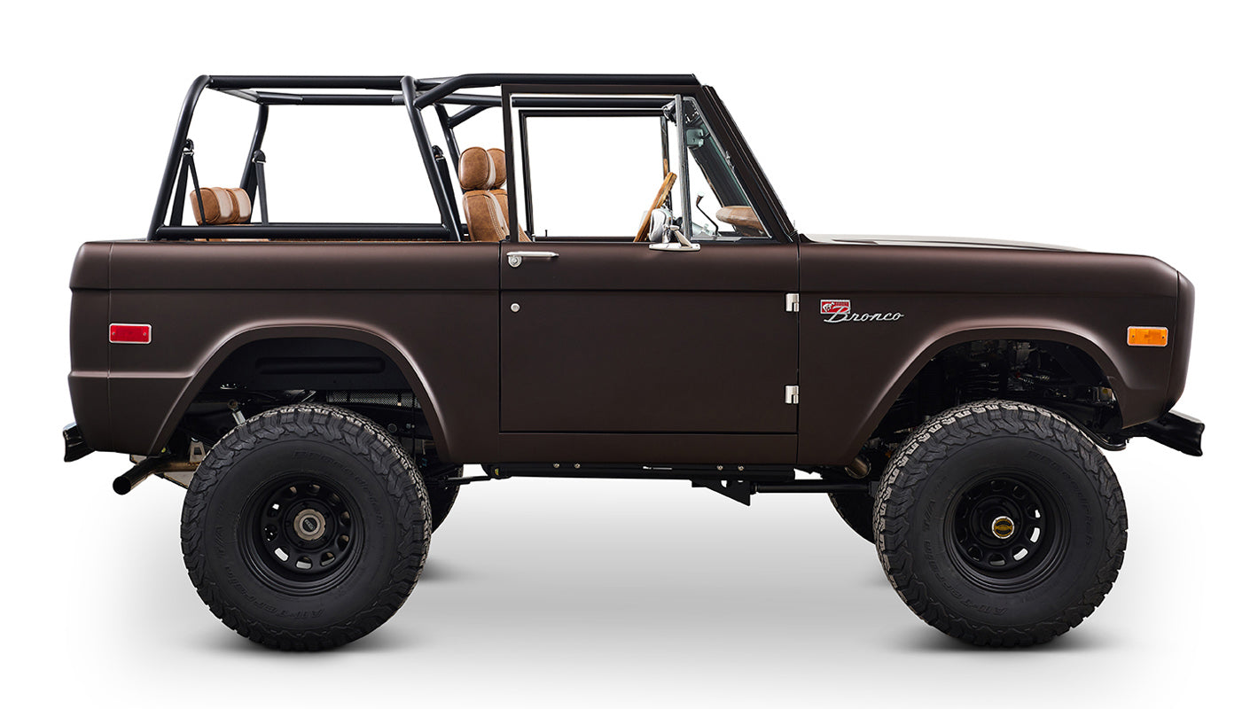 Ford Bronco 1970 in Matte Macadamia Brown with whiskey leather interior and black wheels
