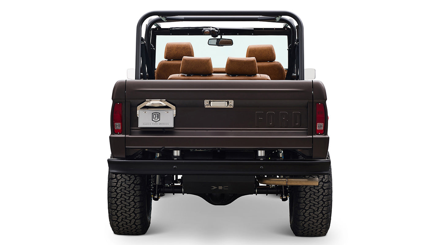 Ford Bronco 1970 in Matte Macadamia Brown with whiskey leather interior and black wheels