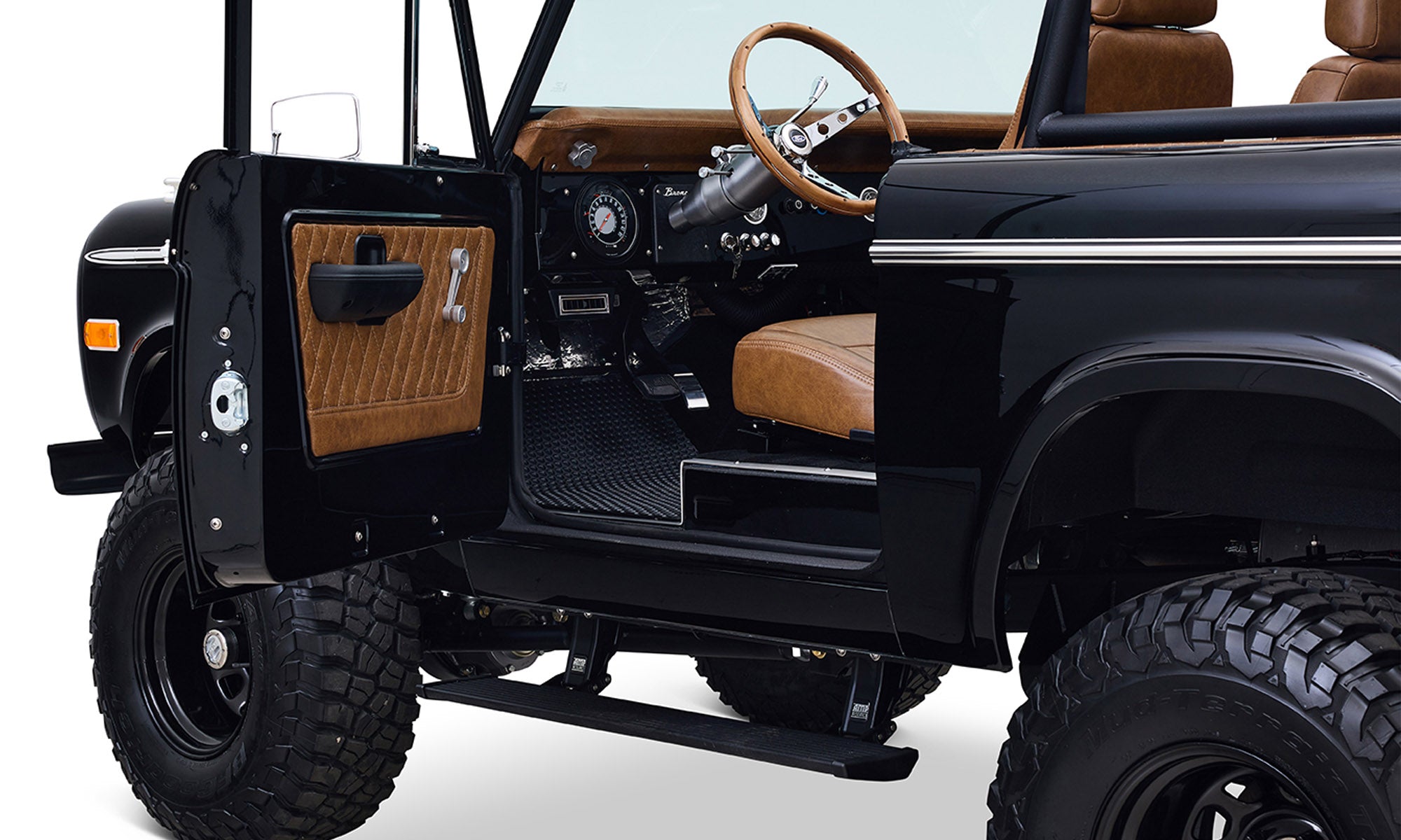 Ford Bronco 1973 Black Coyote Series with Custom Whiskey Diamond Stitch Interior