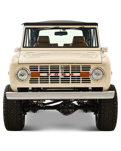 Classic black Ford Bronco rear three-quarter view showing lifted suspension and roll cage