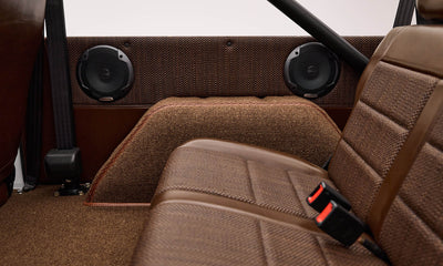 Basket weave custom interior in cigar leather with matching custom carpet