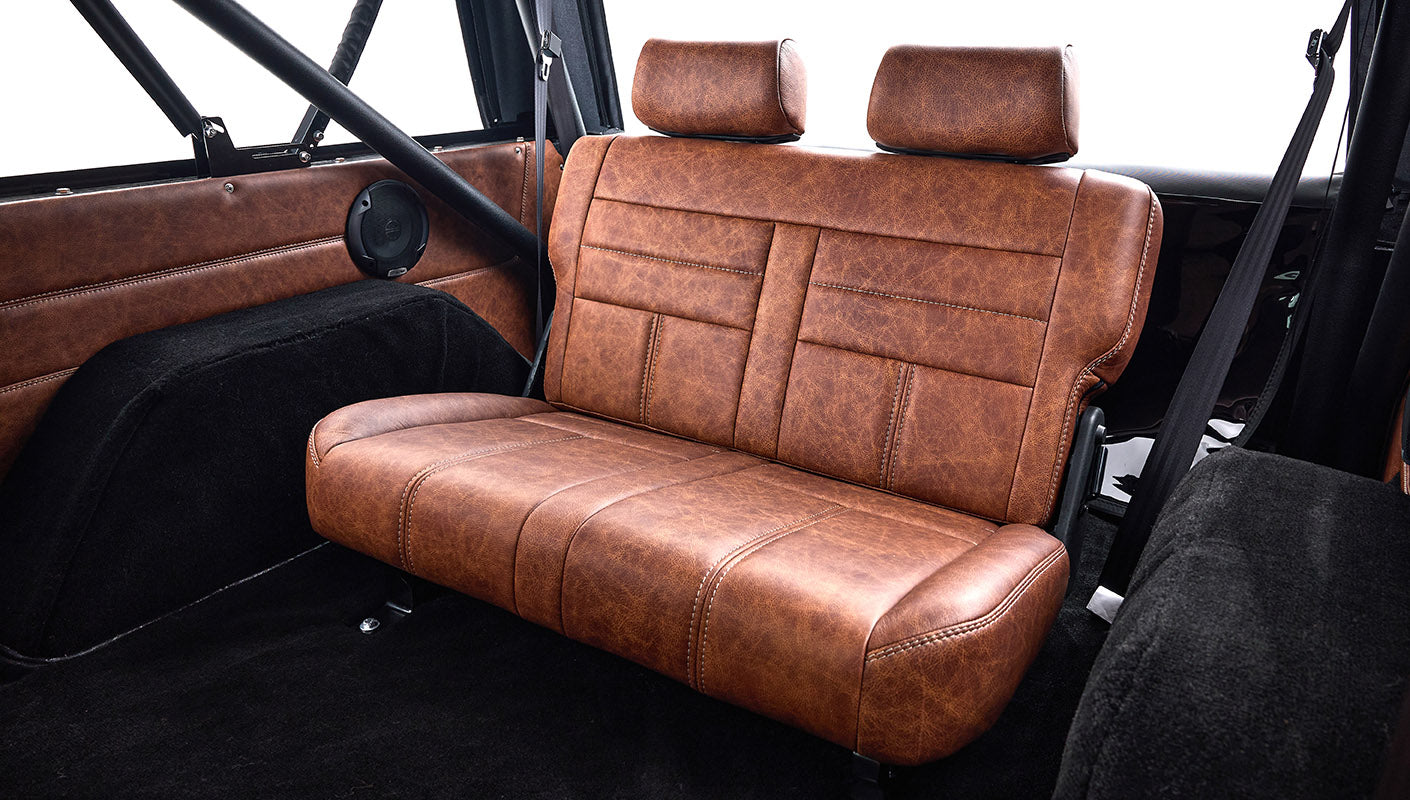 Ford Bronco 1977 302 Series in Adventurine Green with Black Soft Top and Custom Stitch Cigar Leather Interior