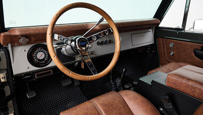 Ford Bronco 1977 302 Series in Adventurine Green with Black Soft Top and Custom Stitch Cigar Leather Interior
