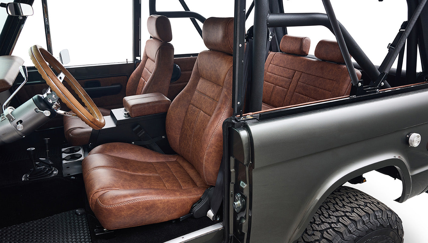 Ford Bronco 1977 302 Series in Adventurine Green with Black Soft Top and Custom Stitch Cigar Leather Interior