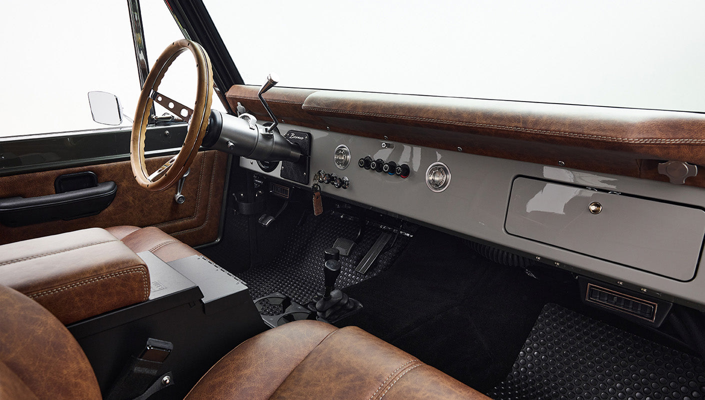 Ford Bronco 1977 302 Series in Adventurine Green with Black Soft Top and Custom Stitch Cigar Leather Interior