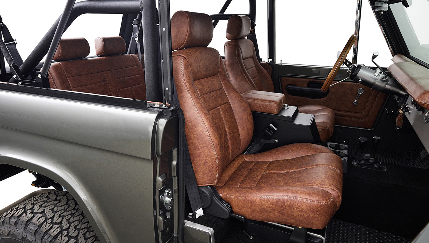 Ford Bronco 1977 302 Series in Adventurine Green with Black Soft Top and Custom Stitch Cigar Leather Interior