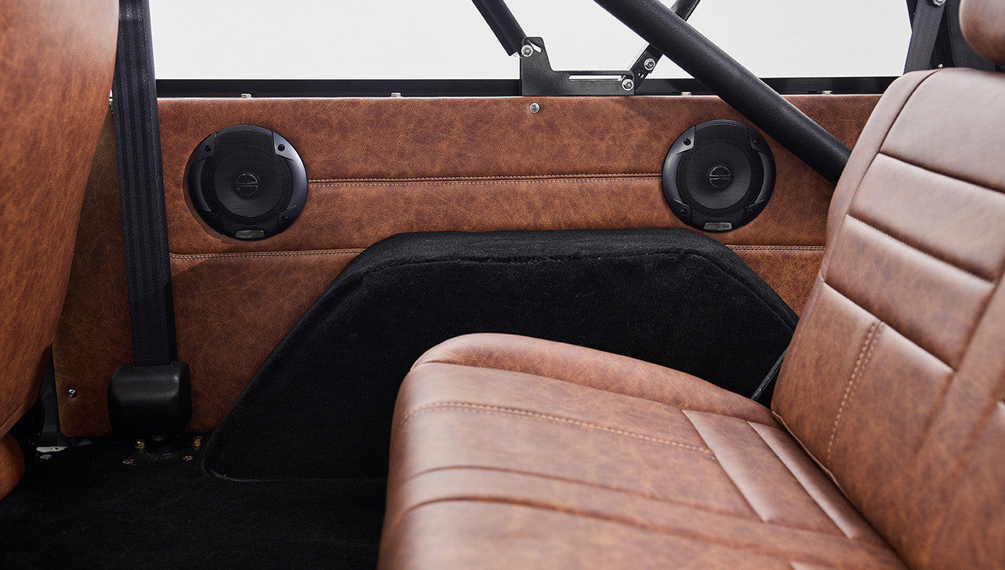 Ford Bronco 1977 302 Series in Adventurine Green with Black Soft Top and Custom Stitch Cigar Leather Interior