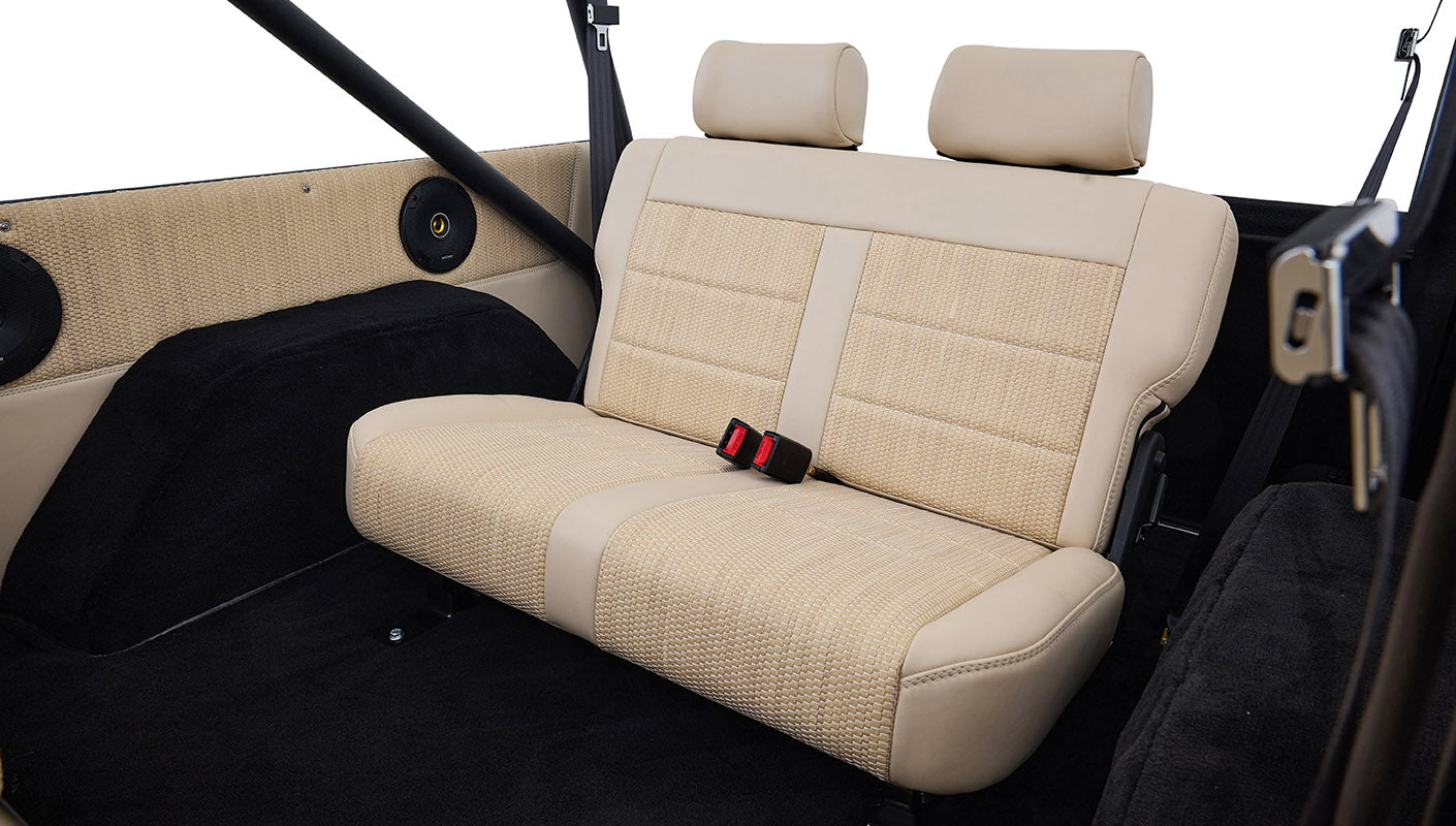 Ford Bronco 1975 in Chrome Yellow with custom Basket Weave Interior and Wimbledon White Wheels